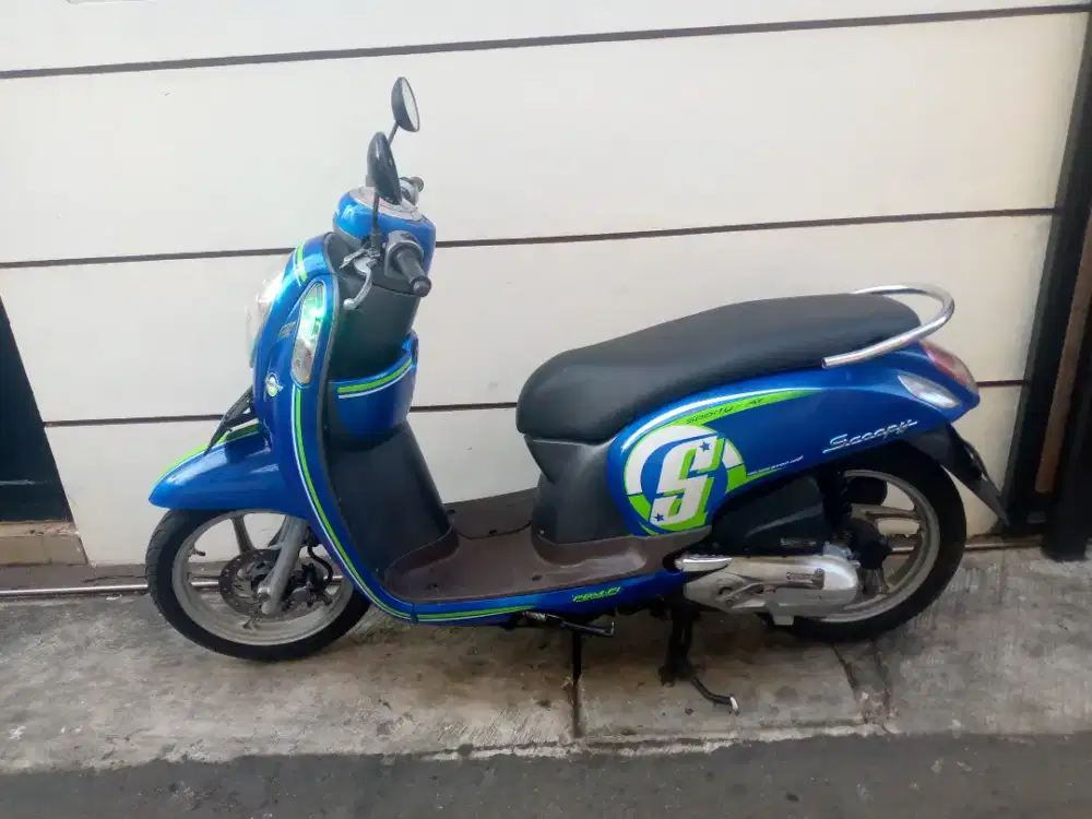 Honda Scoopy-FI iss stater halus
