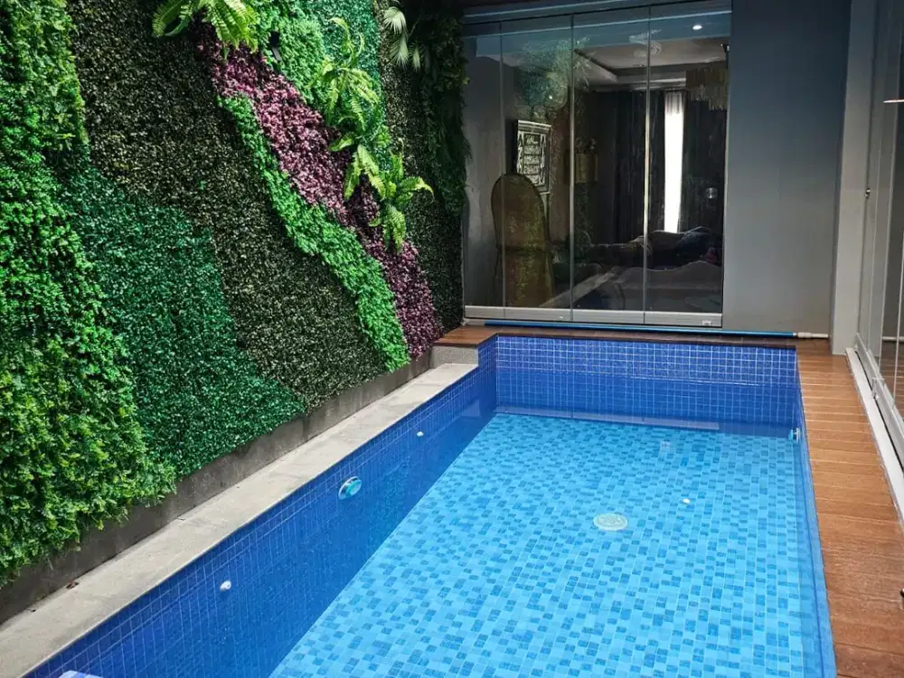 Rumah mewah ada kolam renang pribadi di cluster harapan indah 2 bekasi