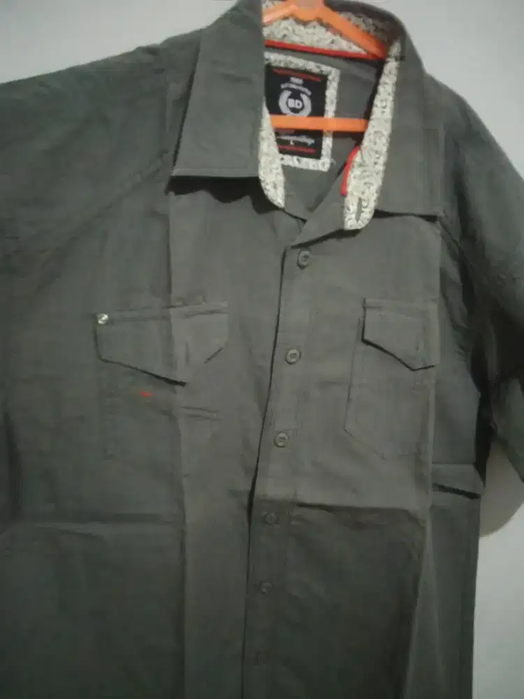 Kemeja merek BD. CORP