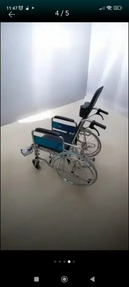 Kursi roda bisa rebahan