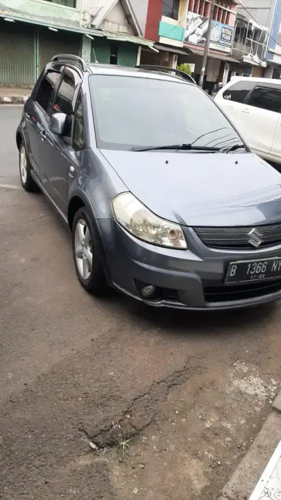 Dijual mobil suzuki x over th 2007 at