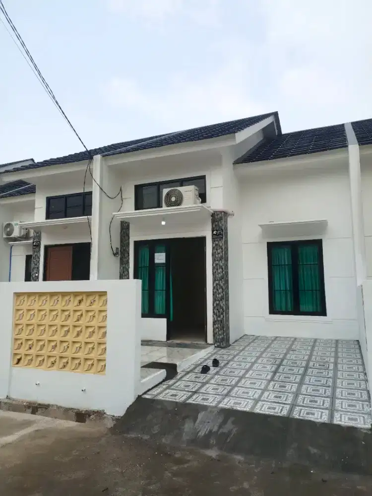 Di sewakan Rumah semi furniture AC, Kulkas, Kitchen set. Bebas Banjir
