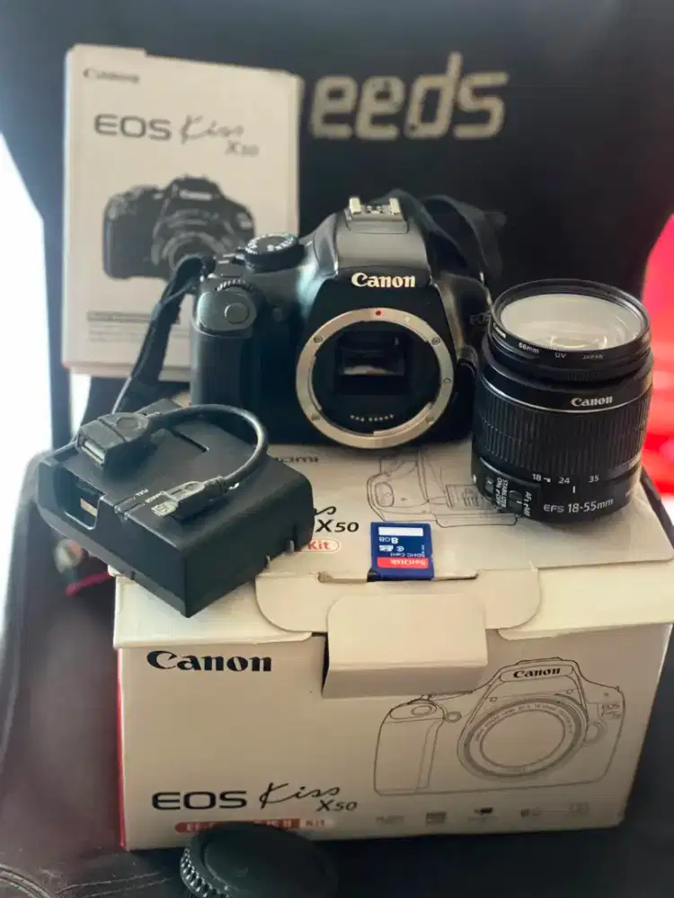 camera !! CANON 
Eos kiss x50
