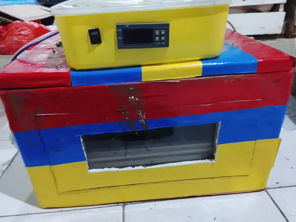 Mesin tetas telur semi otomatis
