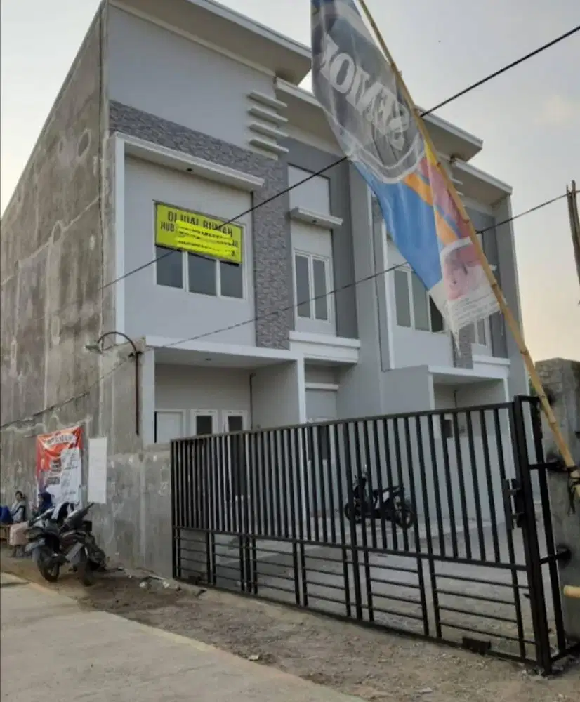 Tanah beserta 2 rumah