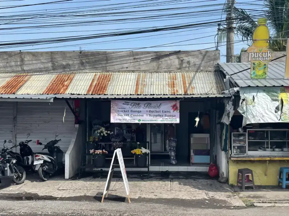 Over contract ruko di sis jalan raya