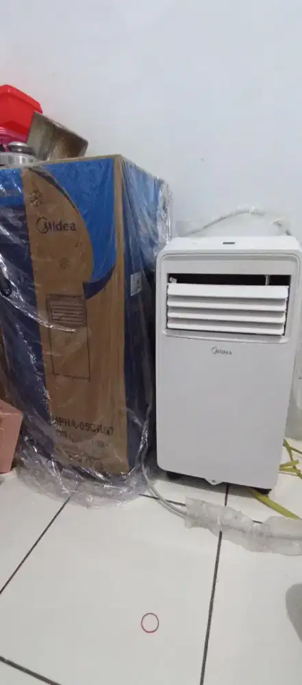 AC portable midea 1/2 PK
