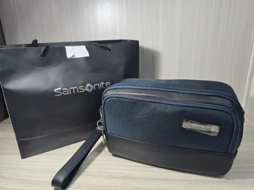 Tas samsonite 2 way clutch warna navy