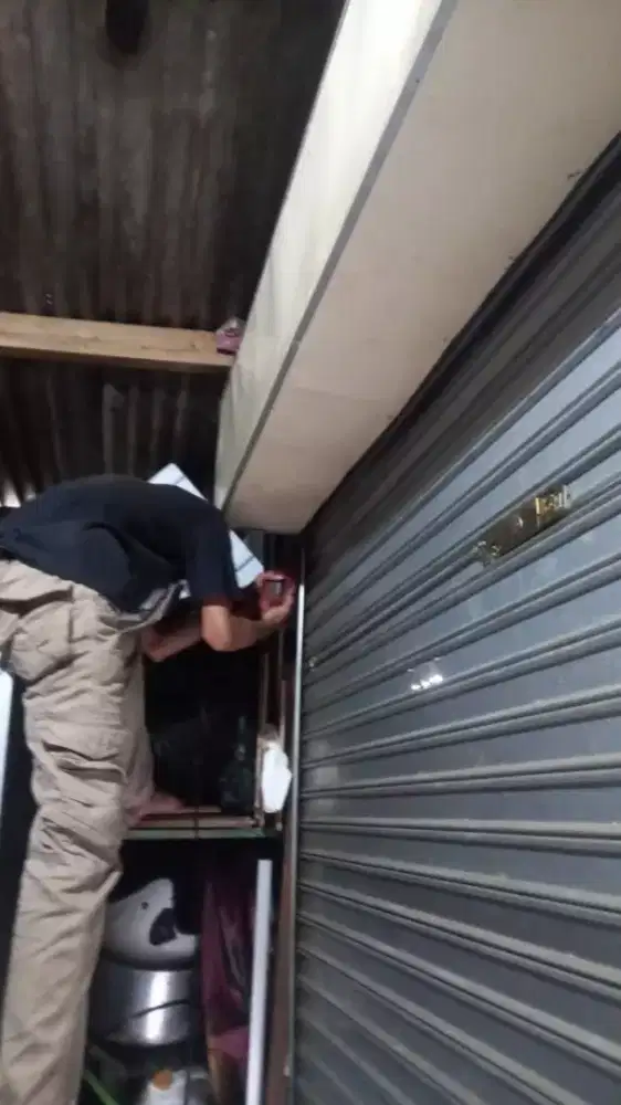 tukang perbaikan pintu rolling door folding gate