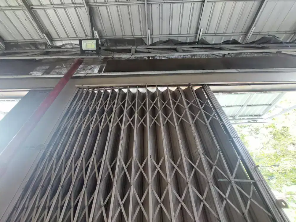 tukang service rolling door folding gate bergaransi