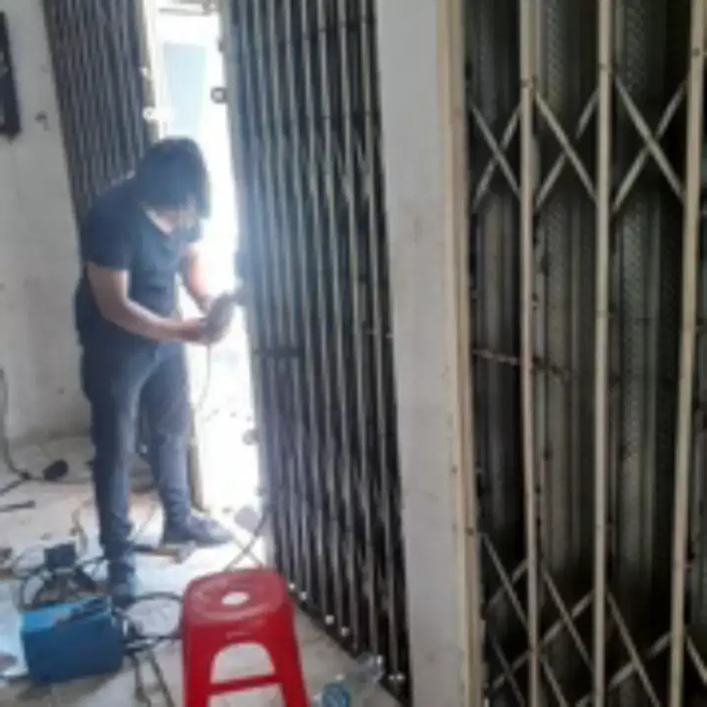 tukang ahli service rolling door folding gate murah