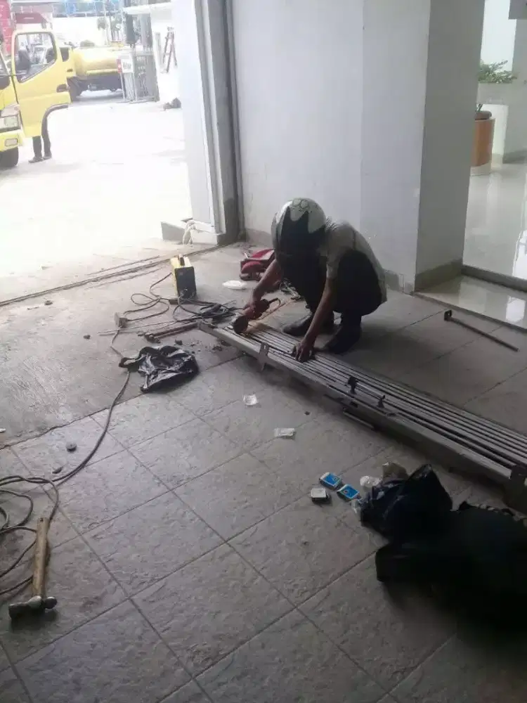 tukang service rolling door folding gate termurah