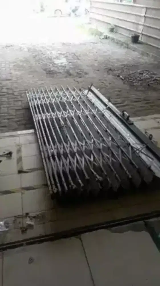 tukang service rolling door folding murah berkualitas