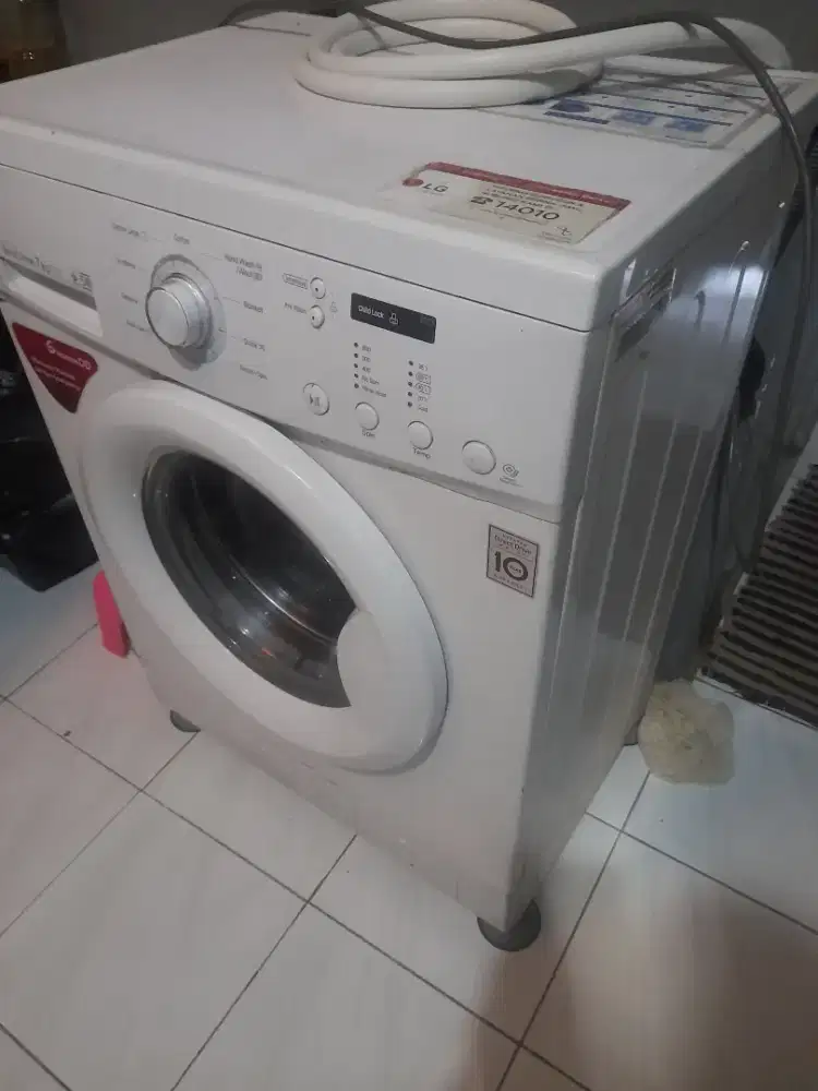 Mesin cuci LG 7 kg froundlouding
