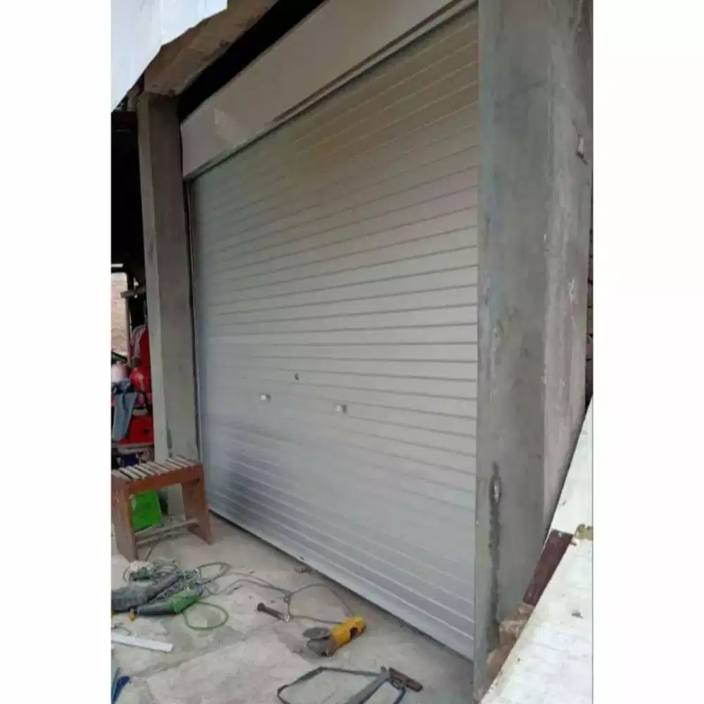 tukang ahli service rolling door folding gate murah bergaransi