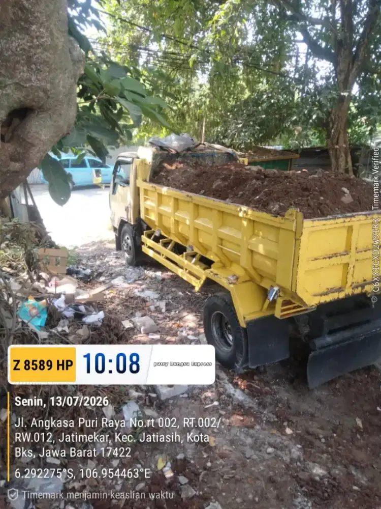 Jasa buang puing dan tanah