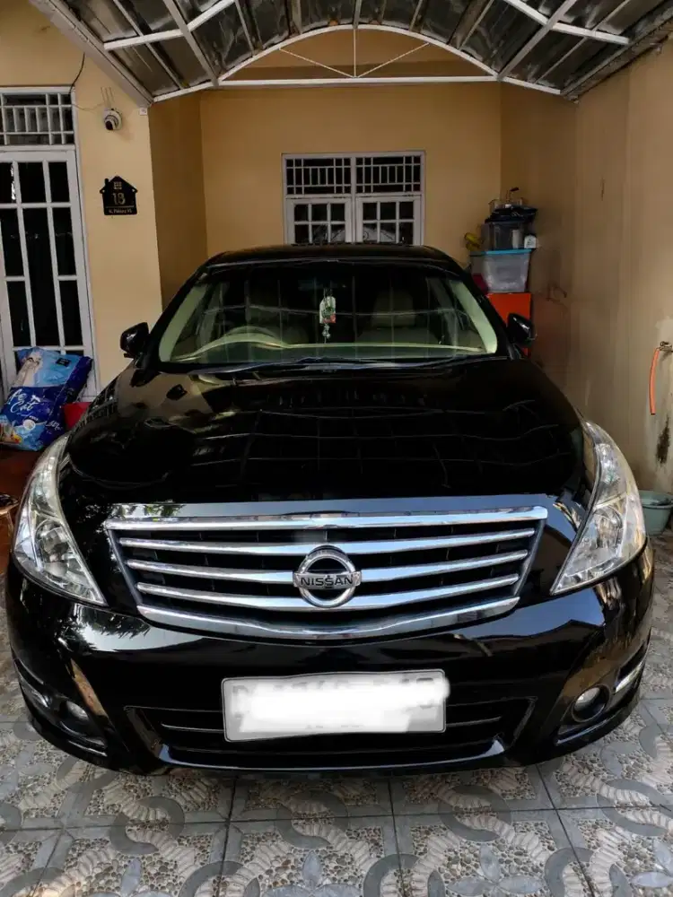 Dijual mobil Nissan Teana warna hitam, mesin masih bagus, ac dingin