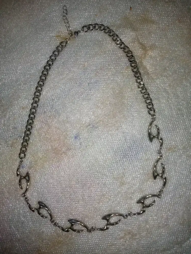 kalung motif api