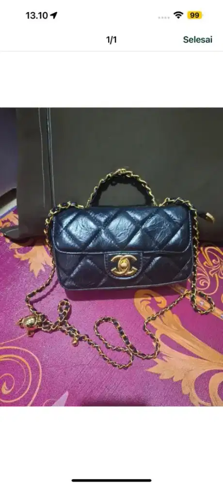 Tas sling warna hitam chanel