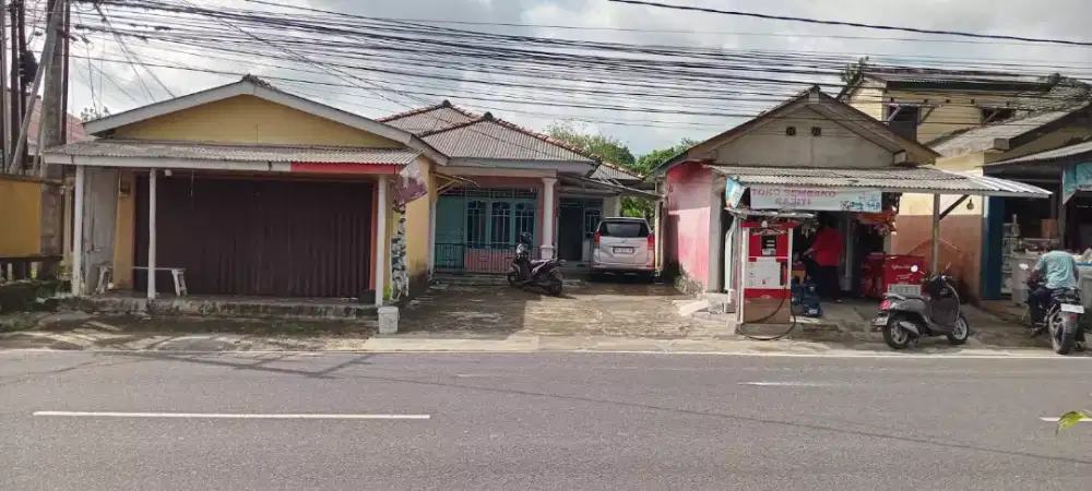 dijual rumah dan tanah pinggir jalan raya Air Itam, lokasi strategis