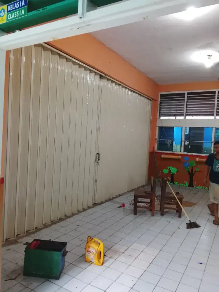 Rolling door folding gate