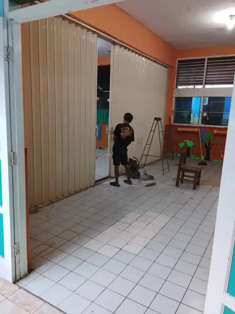 Rolling door folding gate