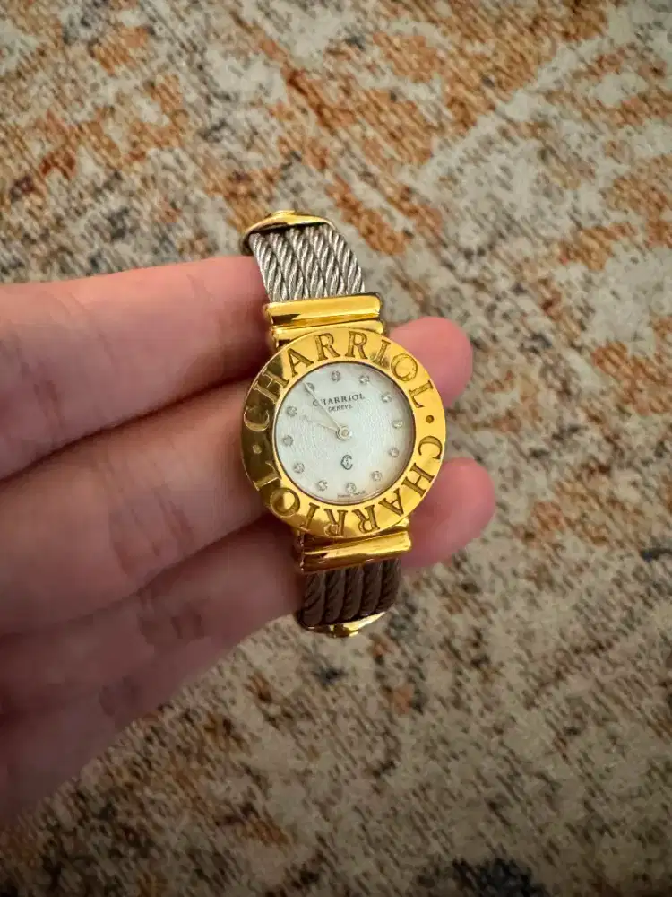 Charriol St. Tropez
cartier bvlgari jam watch