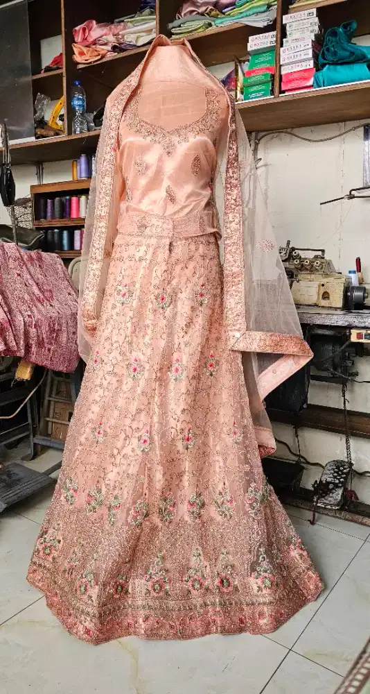 Party wear, peach ladies, net lehenga