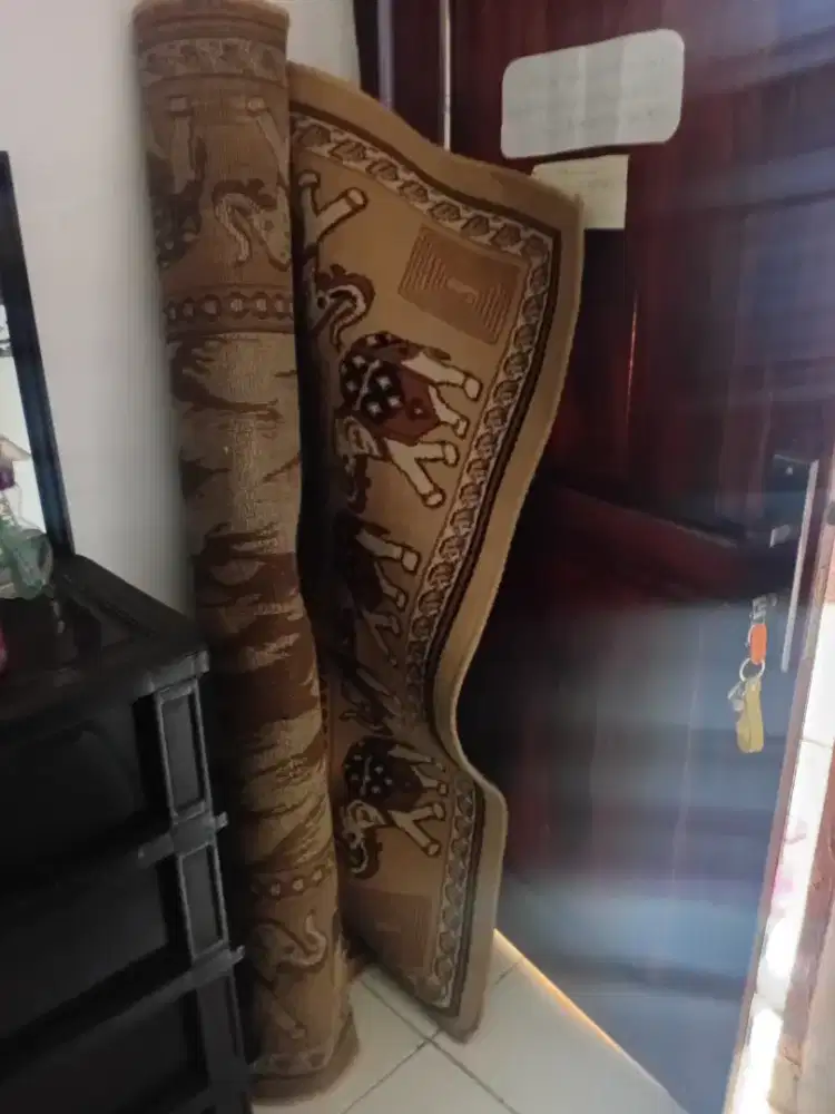 Karpet pinggiran obras motif gajah wrn coklat bekas murah bagus