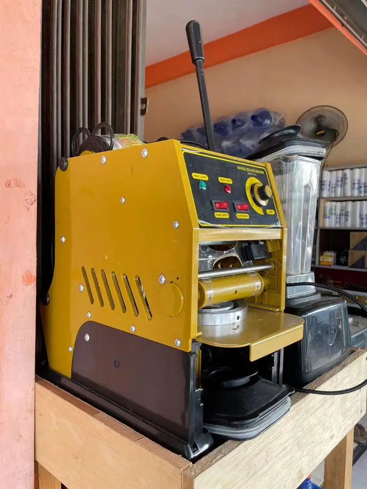 Sealer cup atau press cup otomatis