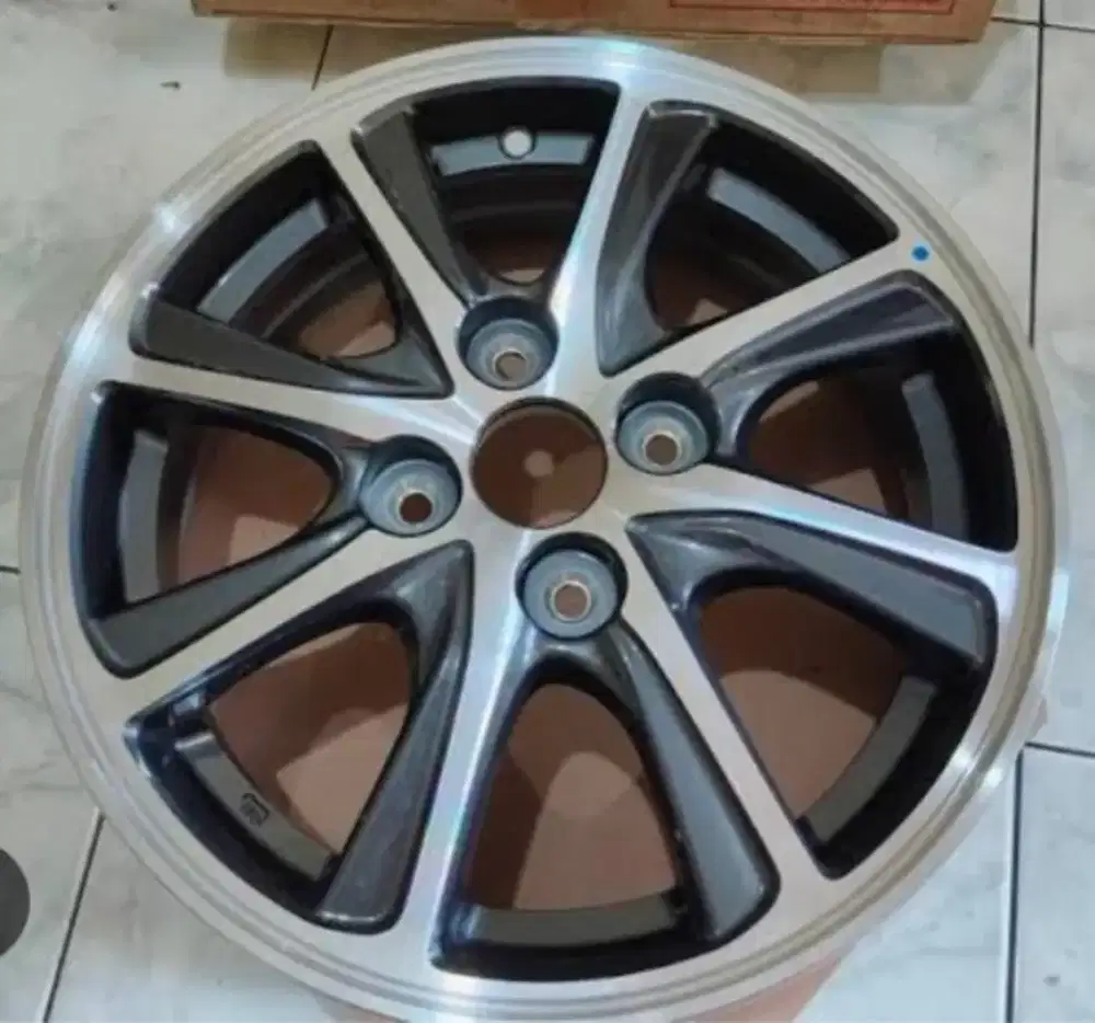 Velg sigra ring 14 tahun