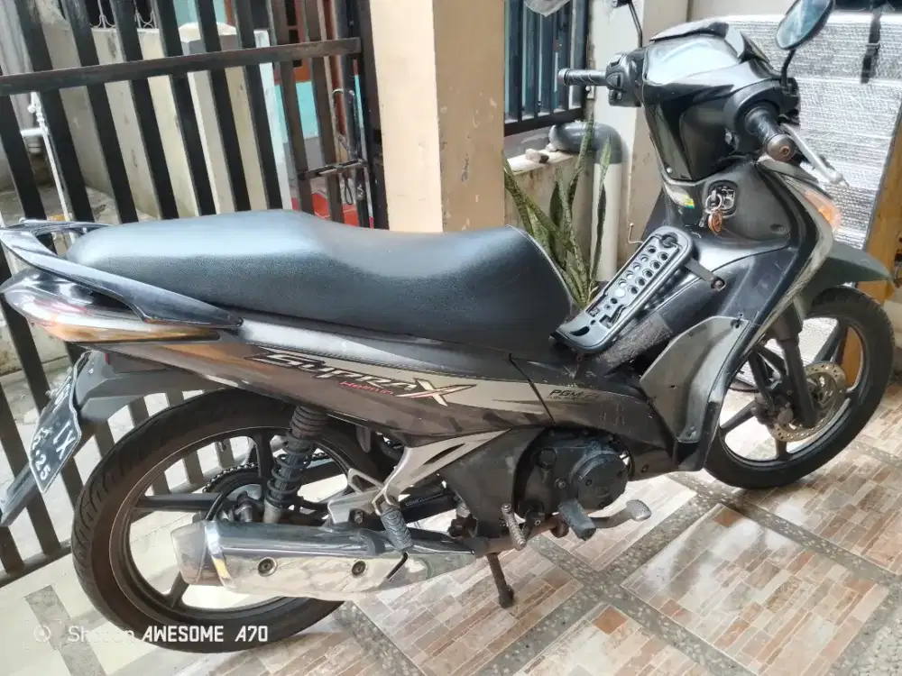 Honda Supra x 125 doubel disk helm in