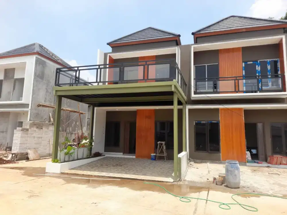 Rumah cluster 2lantaui mewah lokasi premium nempel jalan raya