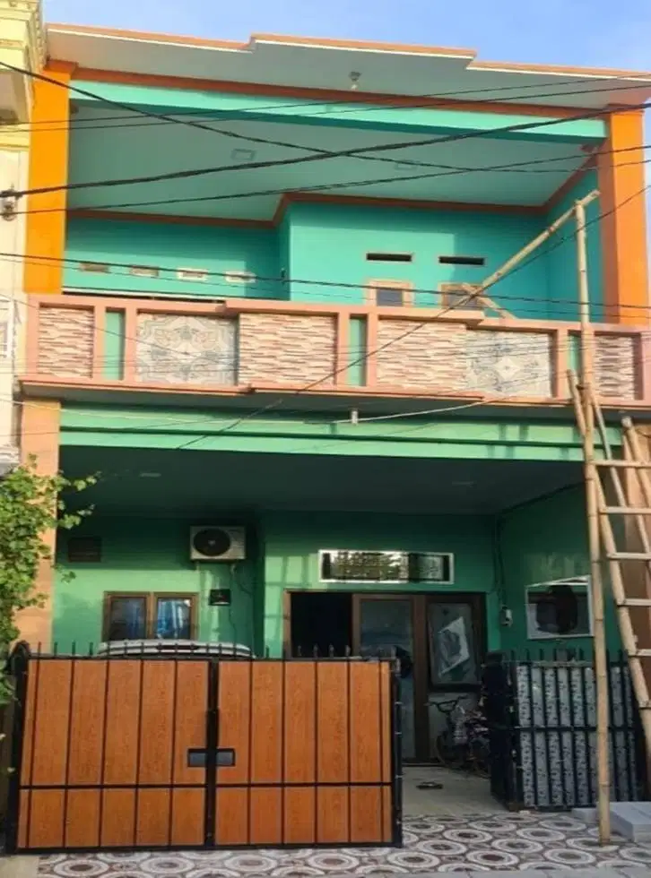 RUMAH DUA LANTAI SIAP HUNI ADA BALKON NYA