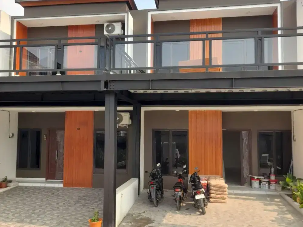 Rumah cluster mewah 2lantai fasum lengkap ,lokasi premium pinggir jalan raya Jatiwarna