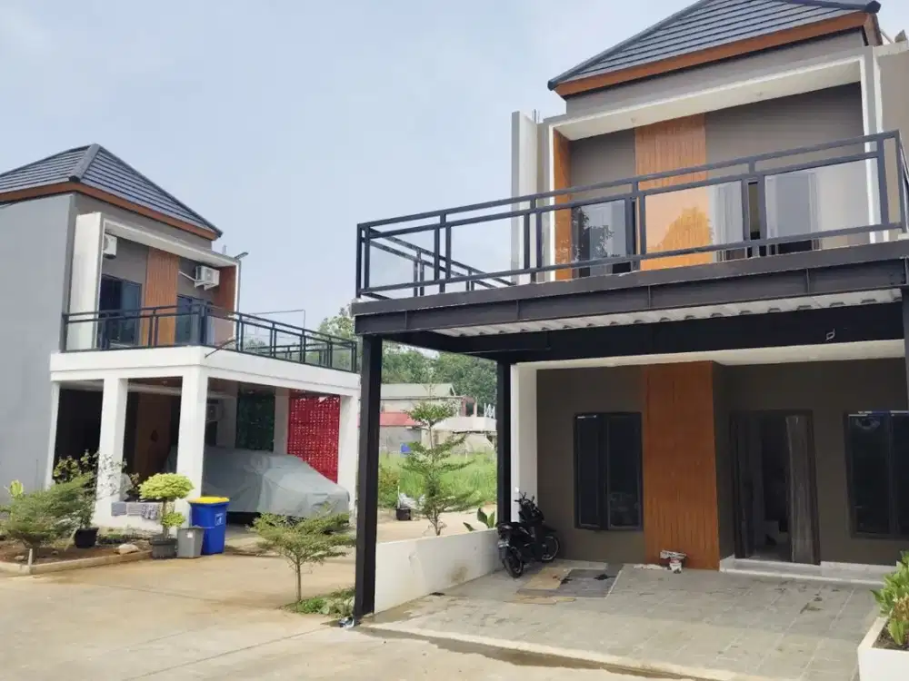 Hunian cluster mewah 2lantai lokasi bebas banjir dekat pintu Tol Jatiwarna harga 900juta an