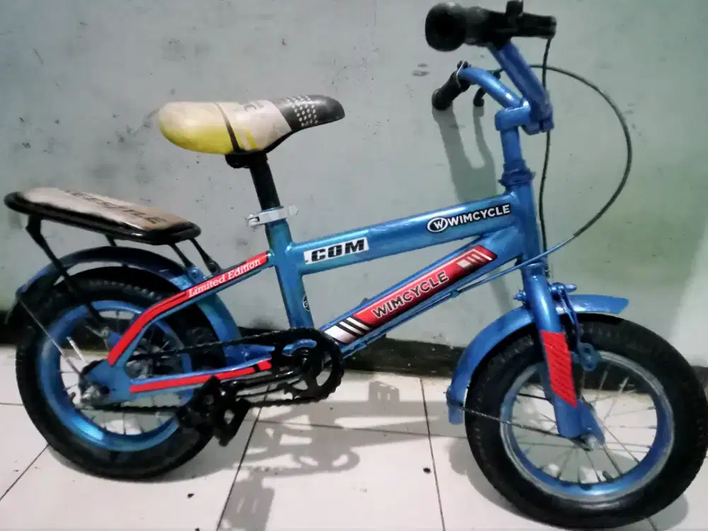 Dijual sepeda BMX merk WIMCYCLE ring 12 kondisi msih bgus keker normal