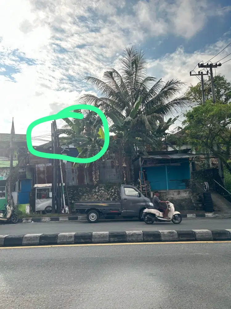Tanah + bangunan non permanen dekat jalan Raya. Nego sampai deal