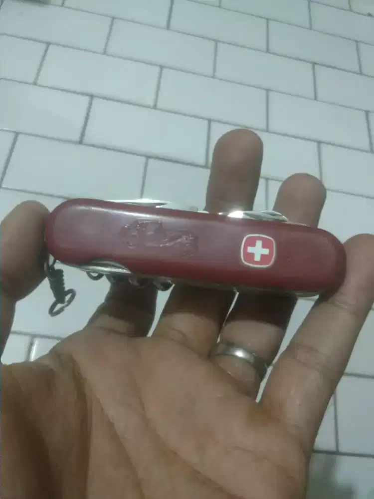 Pisau lipat Wenger victorinox isi 10