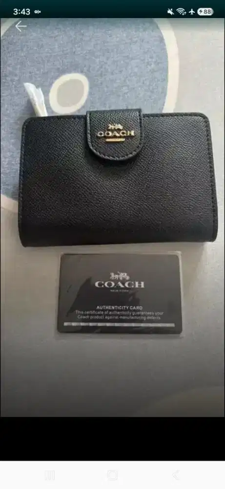 Coach medium corner zip wallet