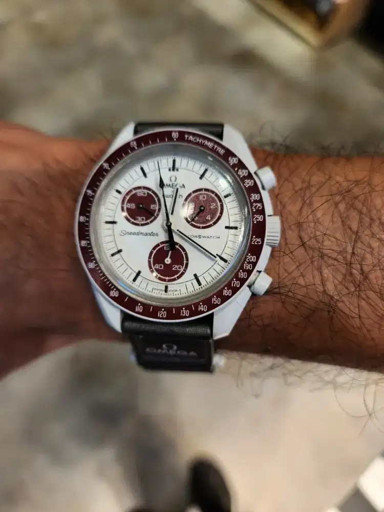 Swatch Omega Pluto