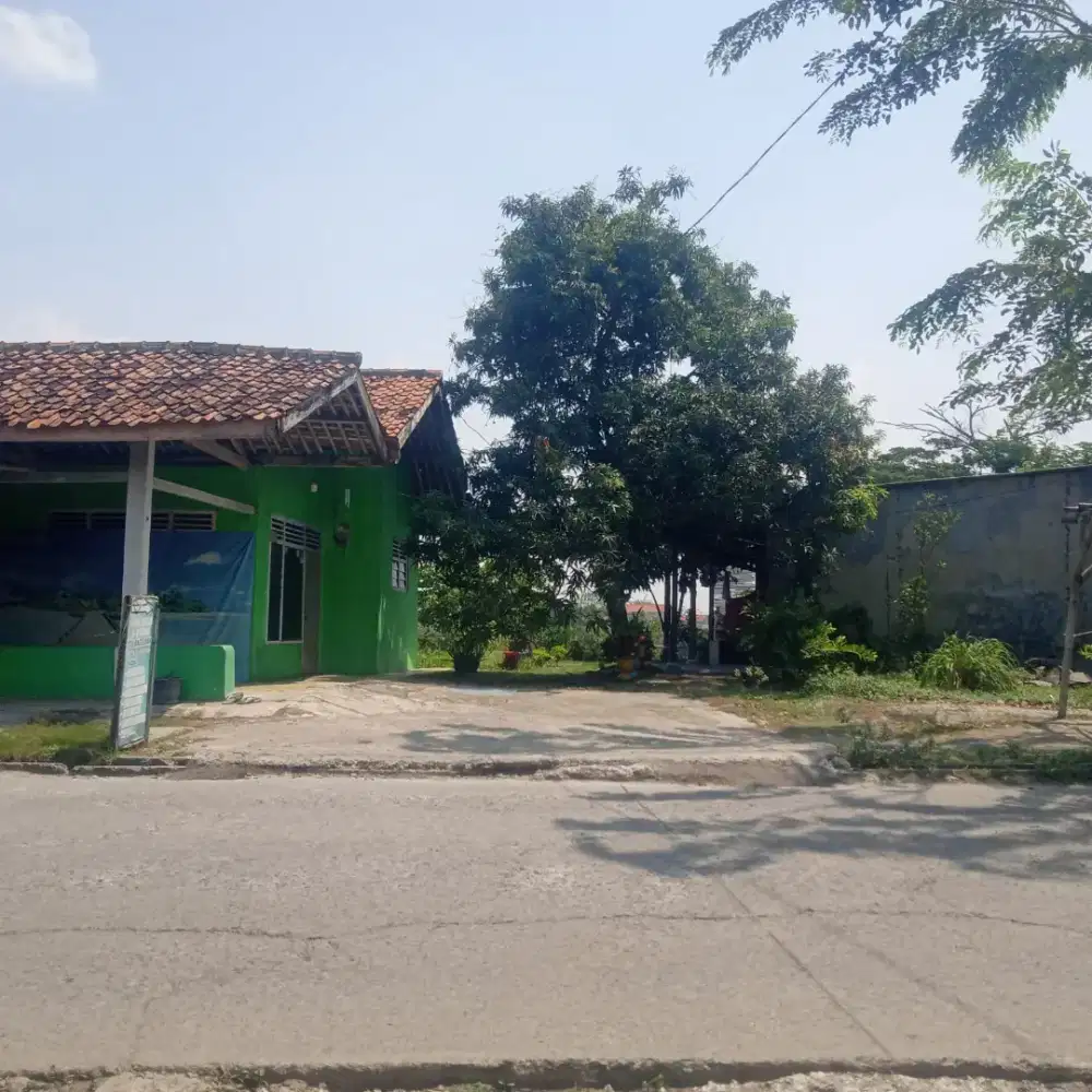 Tanah dijual pinggir jalan bersama bangunanya