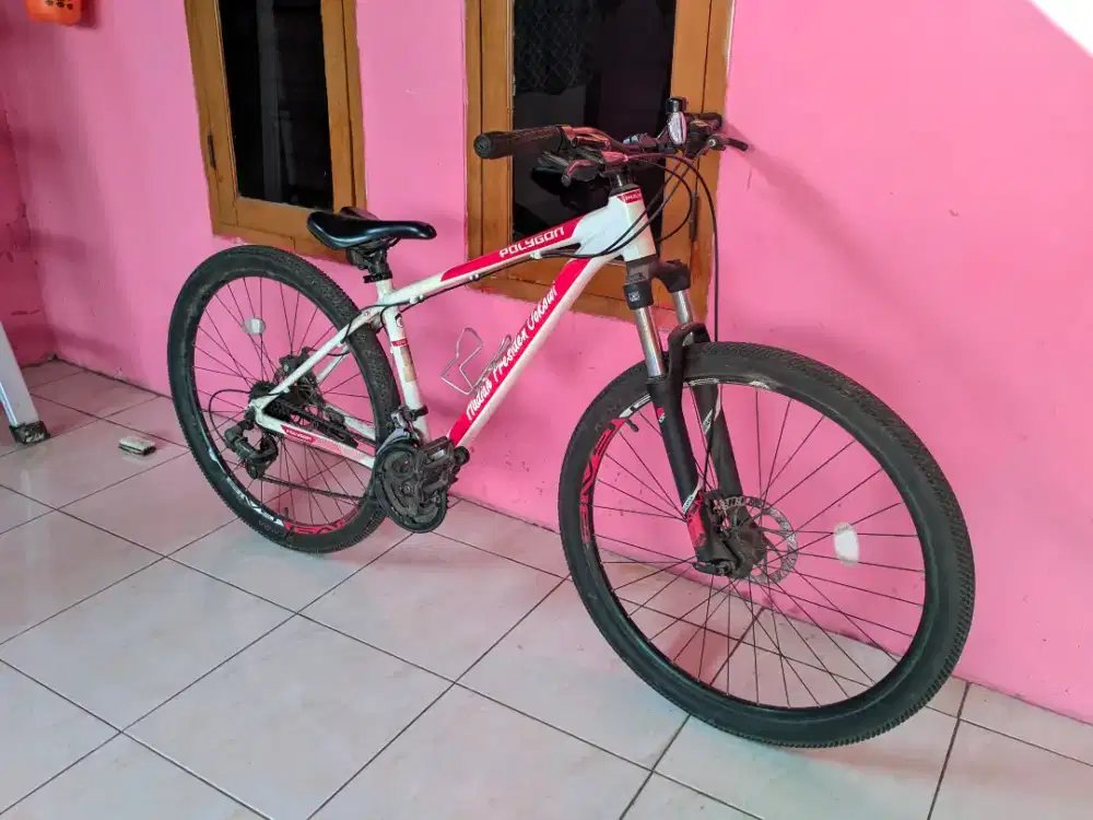 sepeda Polygon SR SUNTOUR XCM
