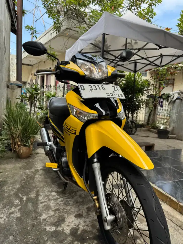 Supra x 125 kuning asli
