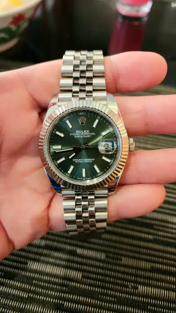 ROLEX DATEJUST 41 GREEN DIAL,MOST POPULAR & RARE DIAL,

95% UNWORN 