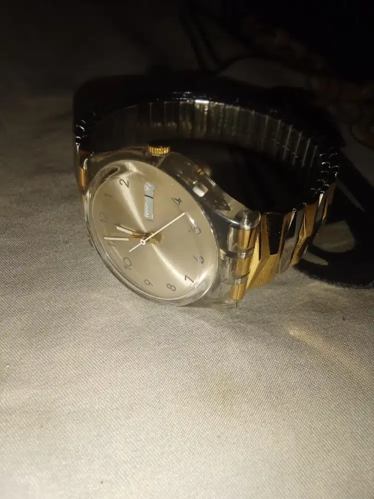Jam tangan Swatch gold stainless steel