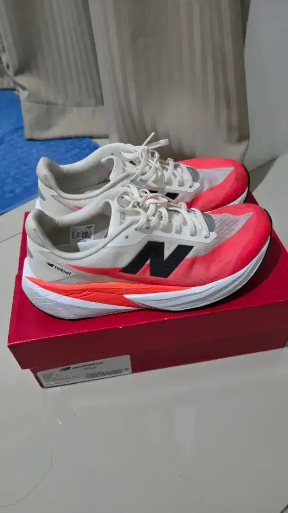 FOR SALE NEW BALANCE REBEL V5 WHITE ORANGE