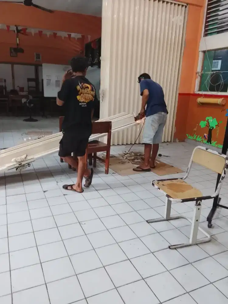 Rolling door folding gate
