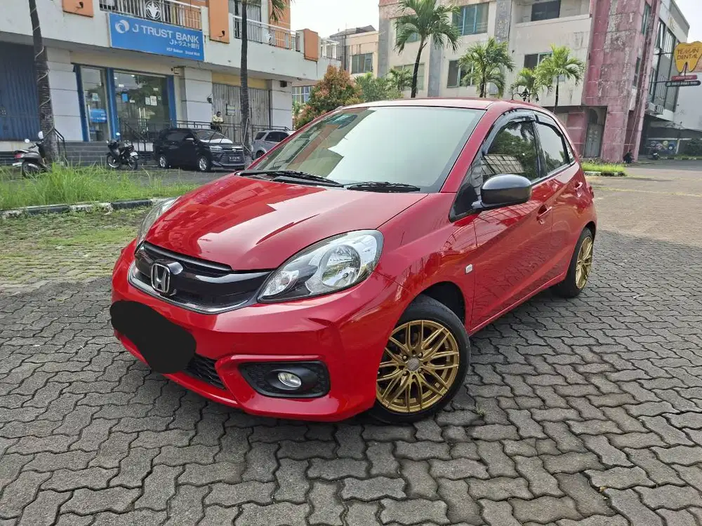 Dijual Santai: Honda Brio Satya 1.2 E Bensin AT 2016 Merah (Pemakaian