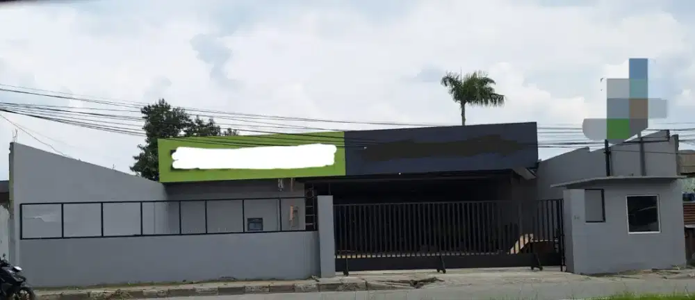 Bangunan dan tanah jl.Sm.Raja km.9,5 Mddan Amplas